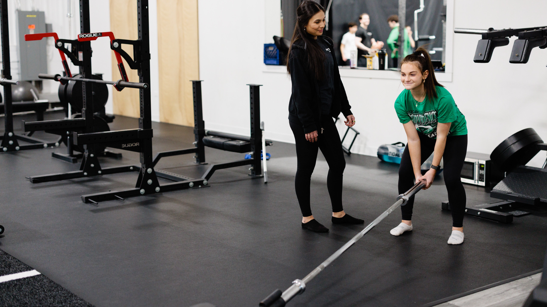 Sports performance coaching with a Method Athletics trainer in the gym