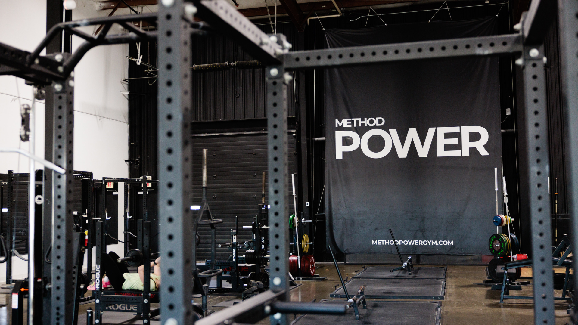 Method Powergym training floor with power racks and METHOD POWER branding
