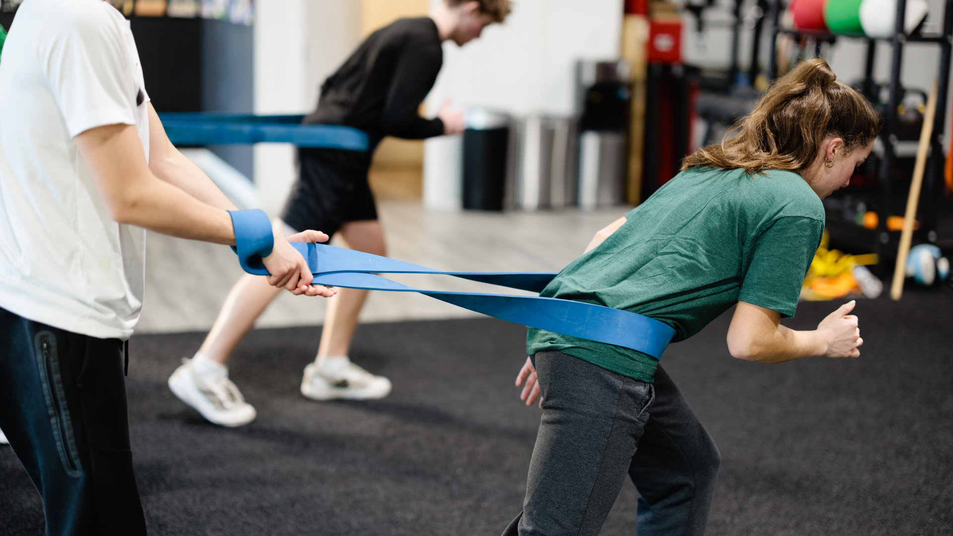 Young athletes training with resistance bands at Method Athletics
